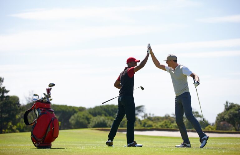 team playing golf