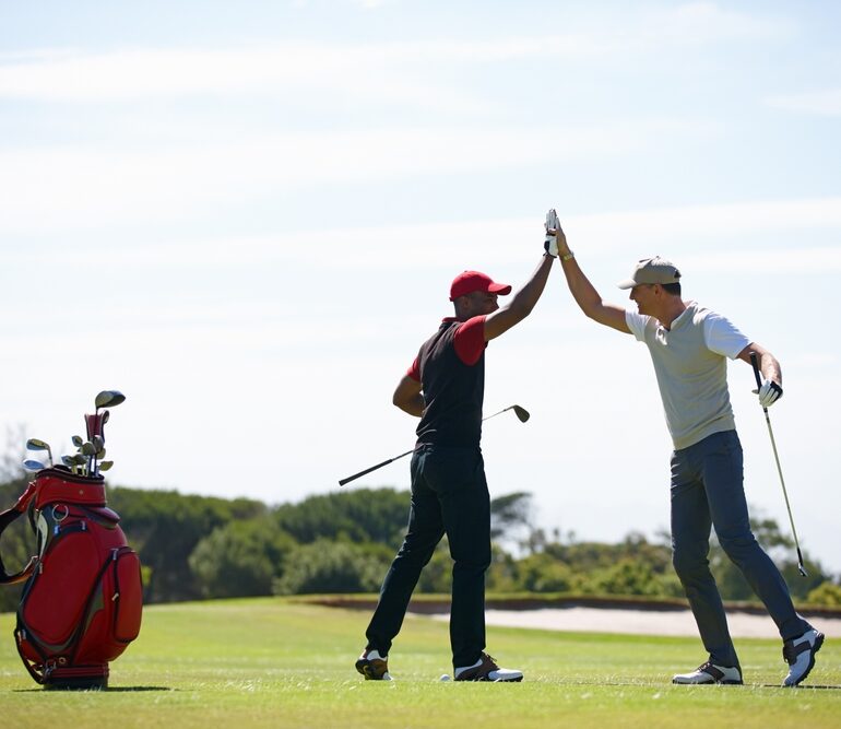 team playing golf